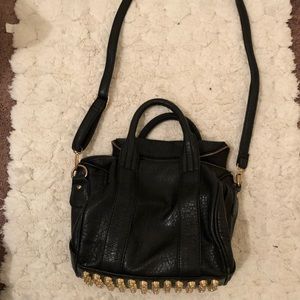 Black faux leather studded bag